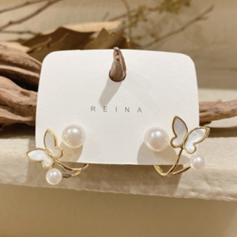 Beautiful butterfly and pearl earrings