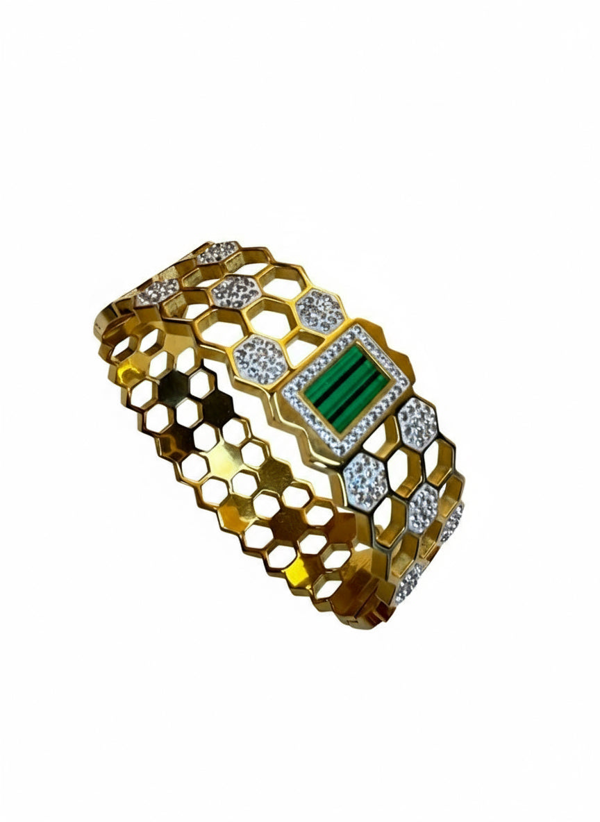 Elegant golden bangle with greenstone