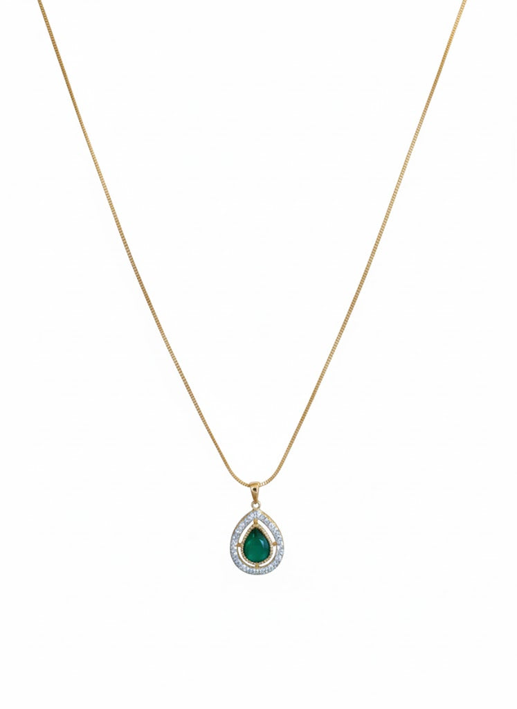 Moissanite pendant set with green stone